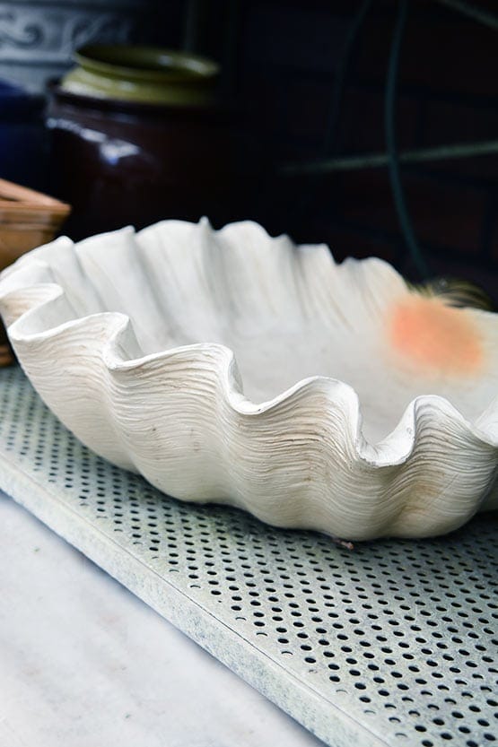 A white bowl sitting on top of a counter.