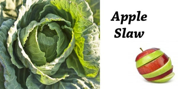 Apple slaw with an apple and a cabbage.