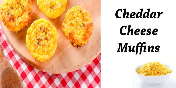 Cheddar cheese muffins on a wooden cutting board at a garden center near me.