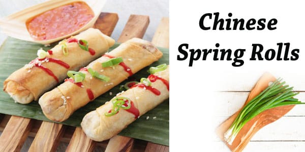 Chinese spring rolls on a wooden cutting board at a SoCal garden center.