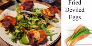 Fried deviled eggs served on a plate at a garden center near me.