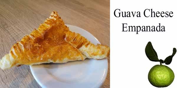 Grana cheese empanada on a white plate with best plant nursery nearby.