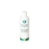 A refreshing bottle of body wash adorned with green leaves on a clean white background.