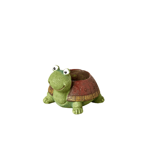 A turtle planter against a black background.