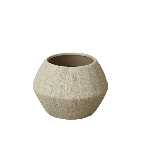 A beige planter on a black background, available at the best plant nursery near me.