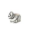 A small zebra shaped planter on a black background at a top garden center near me.