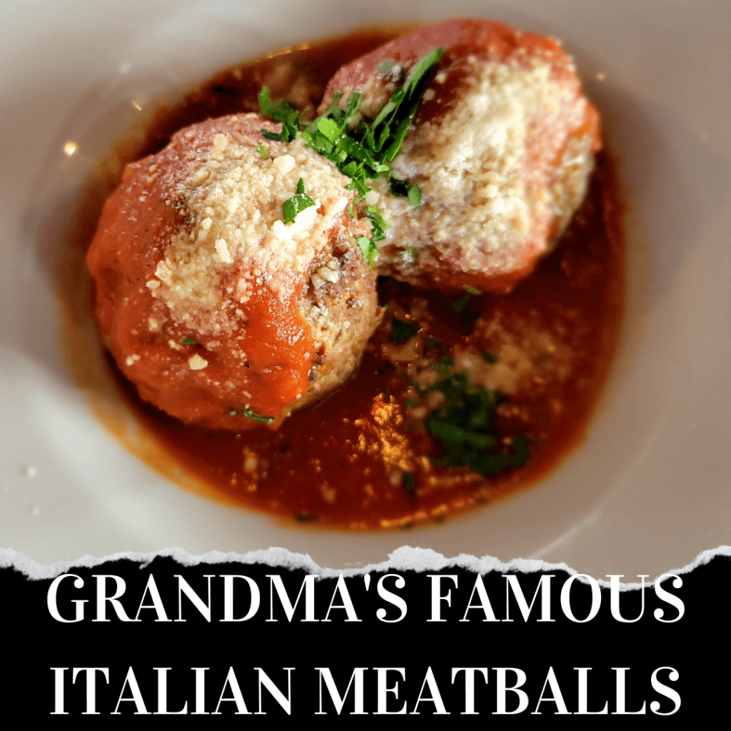 Two meatballs topped with tomato sauce, grated cheese, and chopped parsley are served in a white bowl. The text below reads, "Grandma's Famous Italian Meatballs.