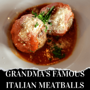 Two meatballs topped with tomato sauce, grated cheese, and chopped parsley are served in a white bowl. The text below reads, "Grandma's Famous Italian Meatballs.