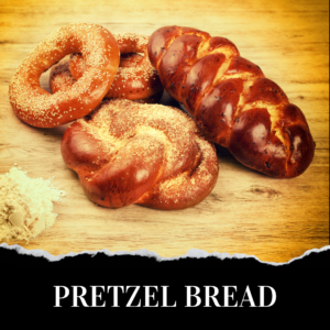 Assorted pretzel breads on a wooden surface with a small pile of flour nearby; text at the bottom reads "PRETZEL BREAD.