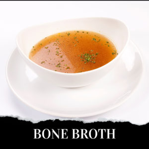 A white bowl filled with clear brown bone broth, garnished with chopped herbs, sits on a matching white plate. The words "BONE BROTH" appear at the bottom of the image.