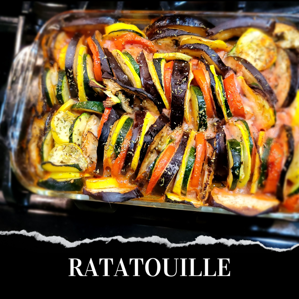 Ratatouille in a baking dish on a stove.