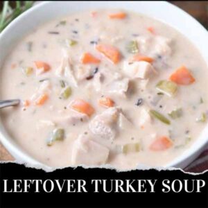 Leftover turkey soup in a bowl with a spoon.