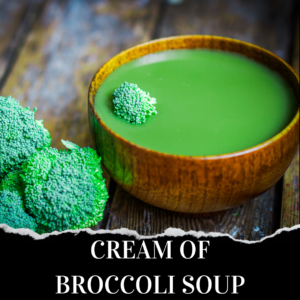 A wooden bowl filled with green broccoli soup sits on a rustic wooden surface next to two fresh broccoli florets. Text below reads "Cream of Broccoli Soup.