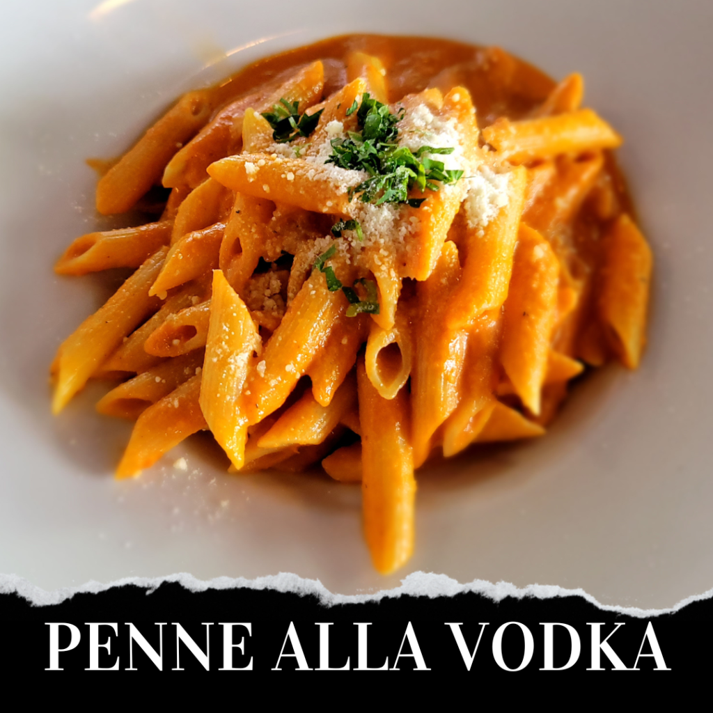 A plate of pasta with the words penne ala vodka.