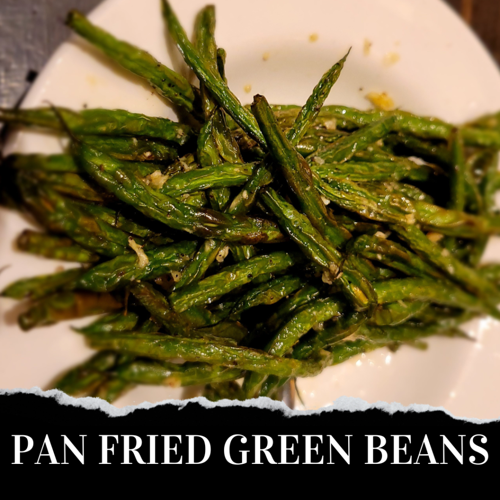 Pan-fried green beans on a white plate.