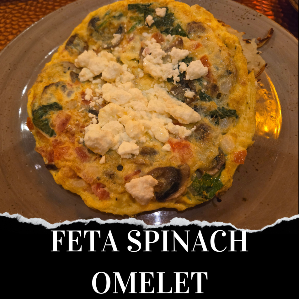 A plated feta spinach omelet topped with crumbled feta cheese, accompanied by text at the bottom reading "FETA SPINACH OMELET.