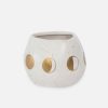 White ceramic pot with a speckled pattern and a series of gold circular designs around the middle.