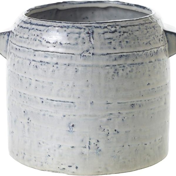 A textured, light gray ceramic pot with a cylindrical shape and indented handles on each side.