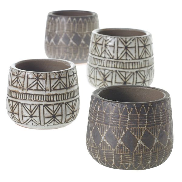 Four ceramic pots with geometric designs in earthy tones, arranged in two rows.