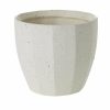 White textured ceramic pot with a simple, rounded shape on a white background.