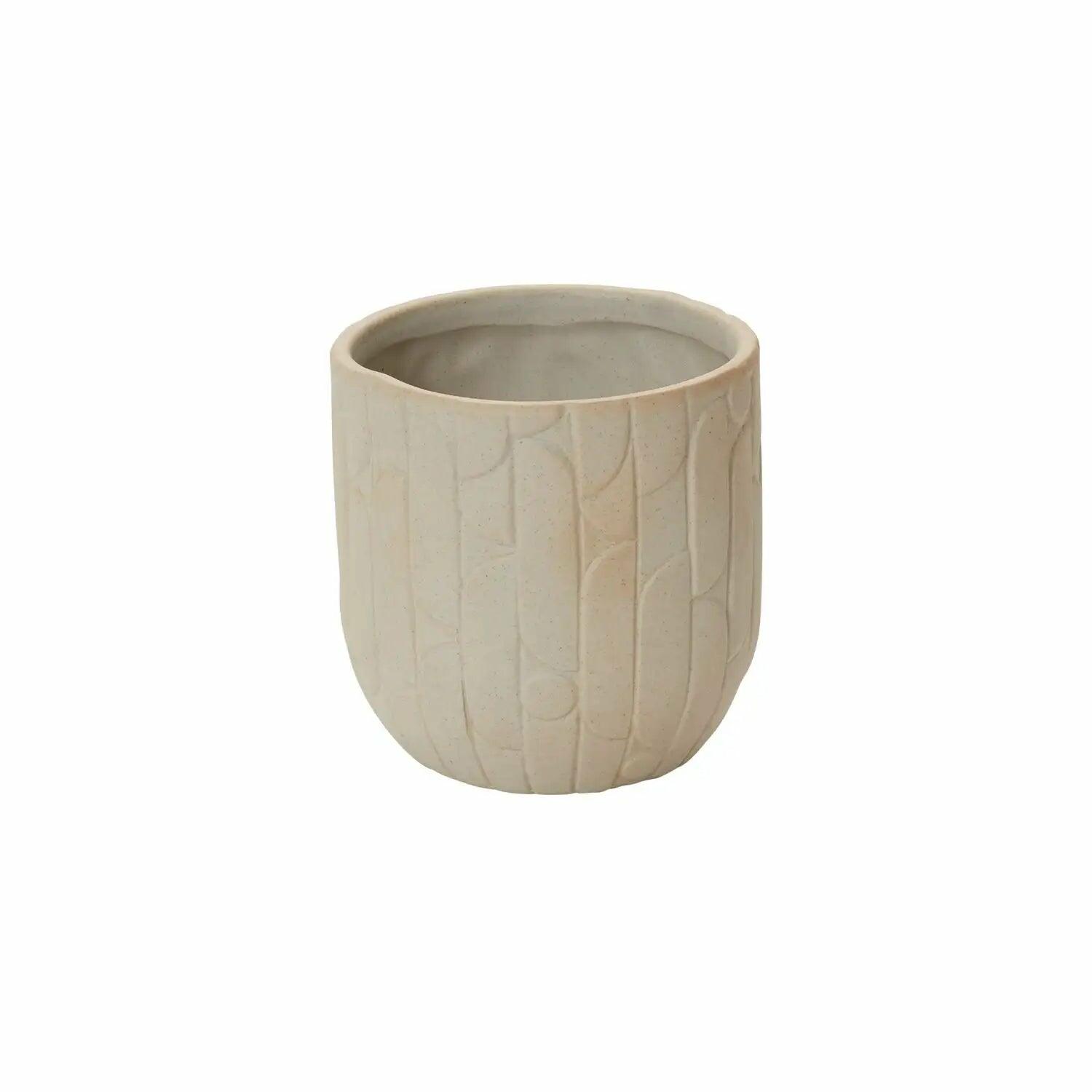 A beige ceramic planter with a subtle textured pattern.