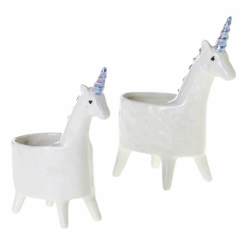 Two white unicorn-shaped planters with blue and pink horns, standing upright on four legs.